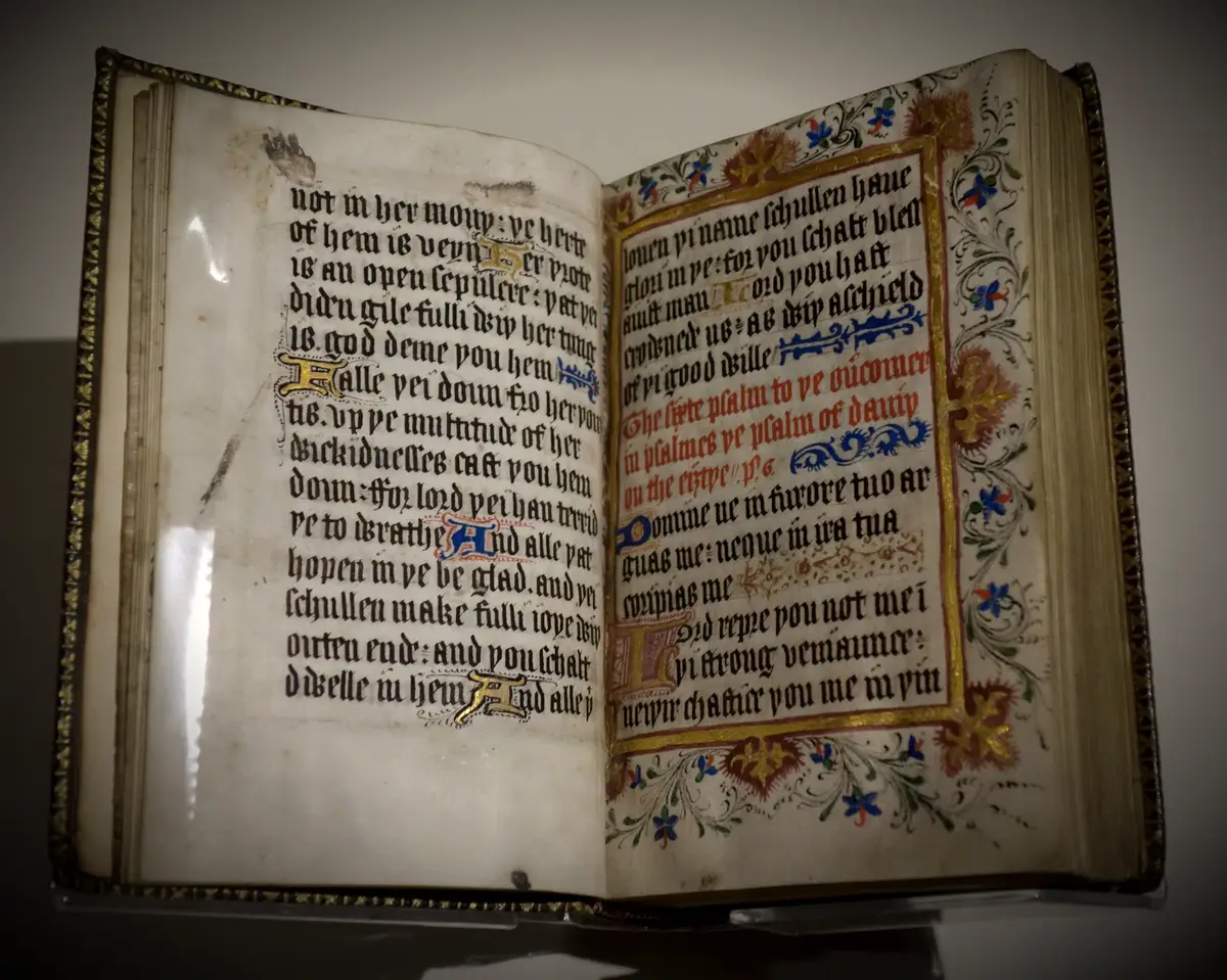 English Scripture is forbidden, copied by hand, and read anyway.